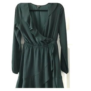 Green ruffle fit and flare dress.